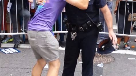 Nypd Officer Dances With Pride Paradegoer S
