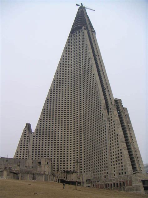 triangle shaped building man  oddities pinterest triangle shape architectural