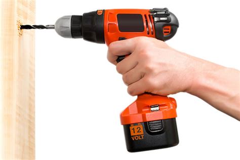 volt cordless drill photograph drilling  hole  wood