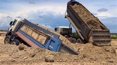 wonderfully overload dump truck spread soils dirt dozer pulling