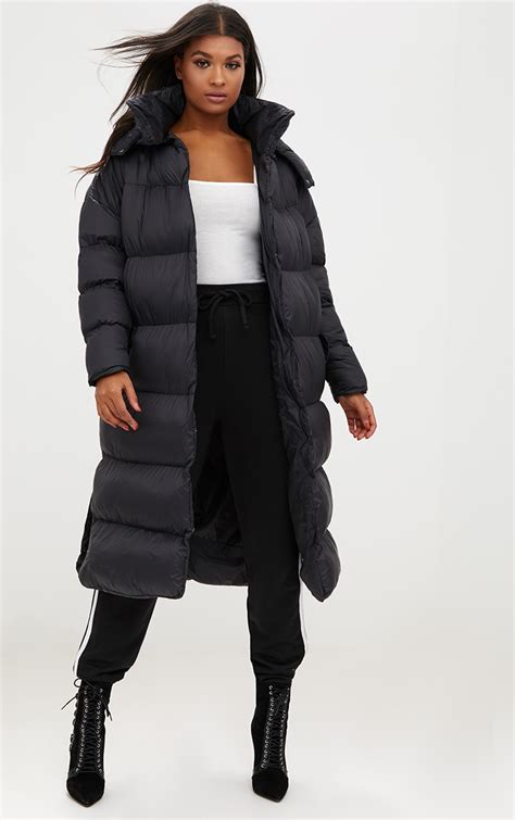 black oversized longline puffer jacket with hood prettylittlething