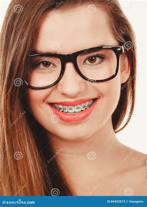 Happy Nerdy Teenage In Eyeglasses Showing Braces Stock Image Image Of