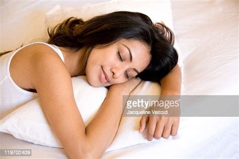 Indian Woman Sleeping In Bed Photo Getty Images