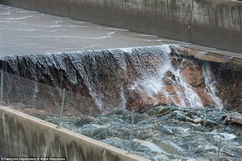 gaping hole grows in the spillway of oroville dam daily mail online