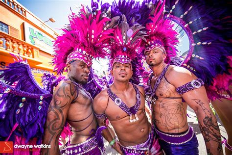 party time at trinidad carnival where men show off their finest warrior inspired outfits