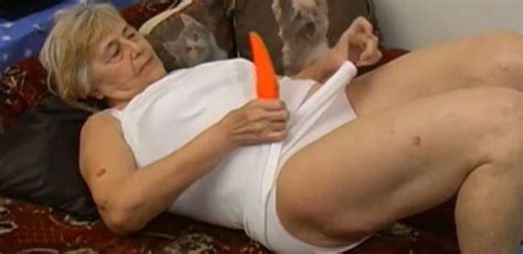 filthy granny is playing with her loose pussy using smooth sex toy