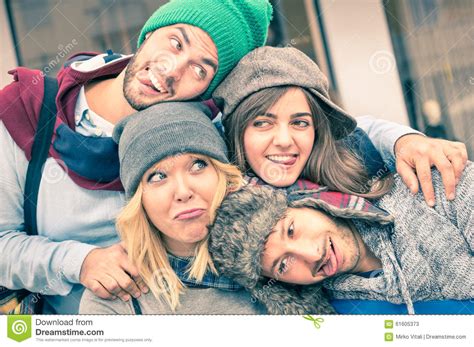 Group Of Best Friends Taking Selfie Outdoors With Funny