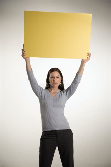 woman holding blank sign royalty  stock  image