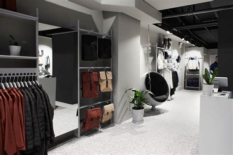 scandinavian brand rains opens concept store  brooklyn wwd