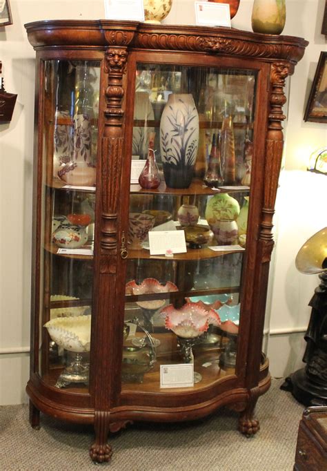 antique oak curved glass china cabinet  claw feet antique poster