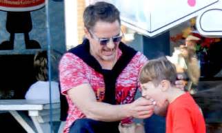 robert downey jr plays doting dad as he feeds his son ice cream daily mail online
