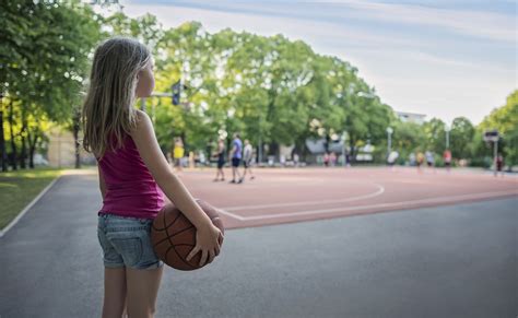 children start playing basketball