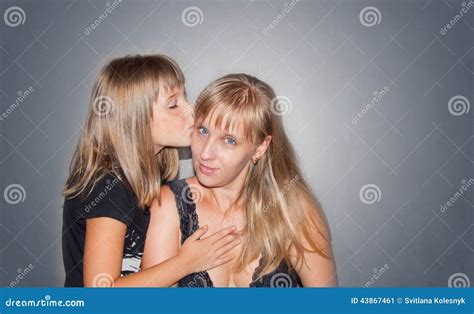 daughter kisses mother stock image image of surface 43867461