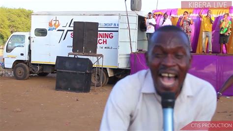 ev douglas otiso singing  praise song   kibera youtube