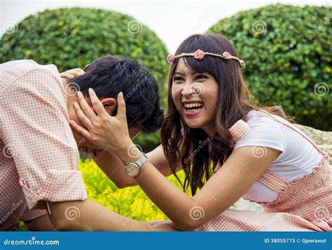 Couple Tease In The Garden3 Stock Image Image Of Play Joyful 38055773