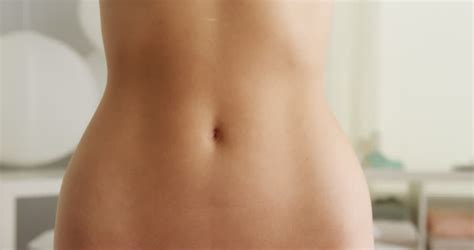 Closeup Of Womans Flat Stomach Stock Footage Video 100