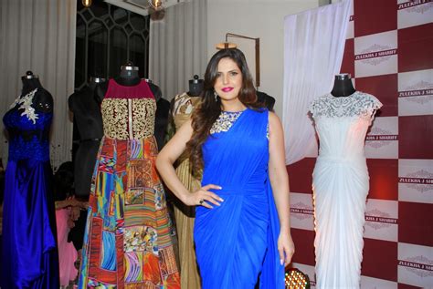 high quality bollywood celebrity pictures zarine khan looks super sexy in a blue saree at