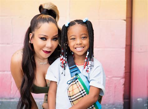 tiny harris poses with monica s daughter and makes the sweetest confession about her goddaughter