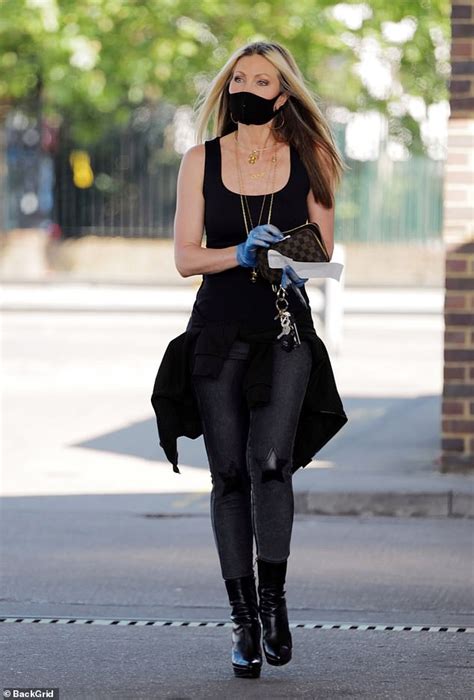 Caprice Nails Edgy Chic In Glossy Jeans Leather Boots And A Black Vest