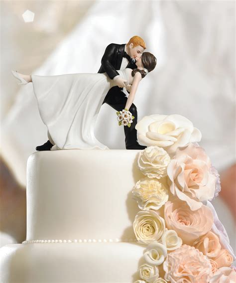 a romantic dip dancing bride groom couple wedding cake topper figurine