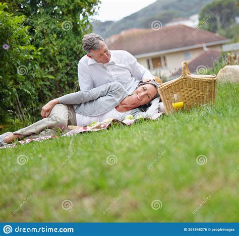 Deeper Love Comes With Maturity A Loving Mature Couple Having A Picnic