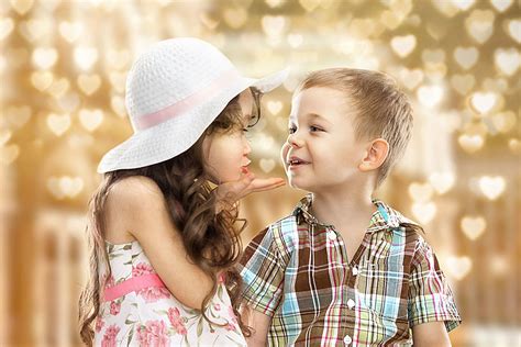 boy  girl share  adorable giggliest kiss   time