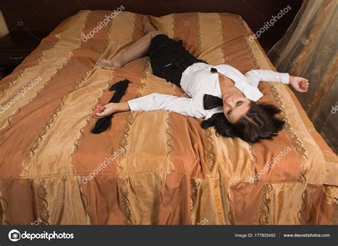 strangled beautiful business woman   bedroom stock photo  demian