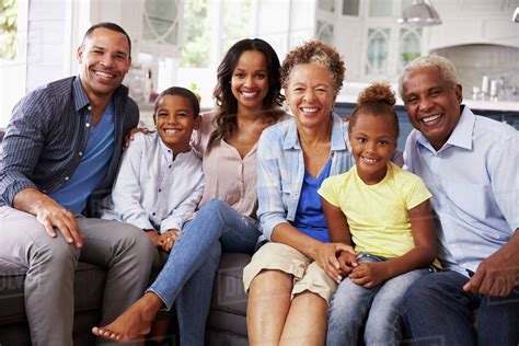 group portrait  multi generation black family  home stock photo dissolve