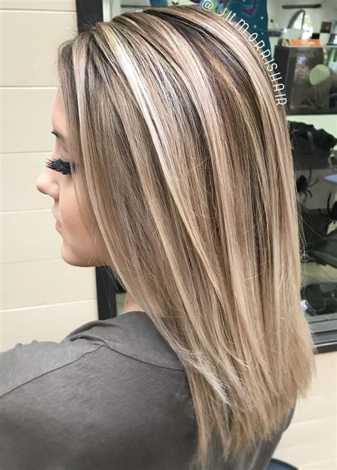 cool ashy blonde balayage highlights with neutral shadow