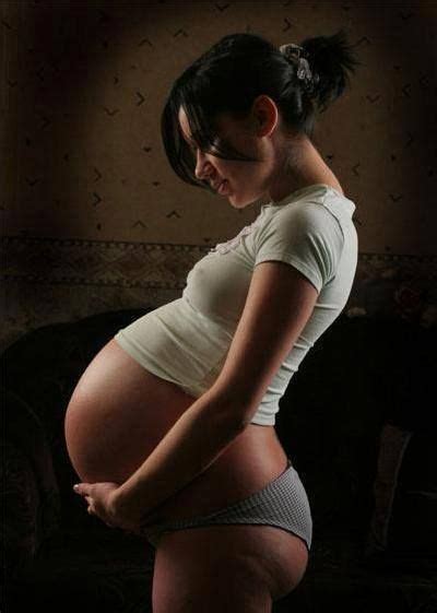 pin on pregnant belly in small clothes