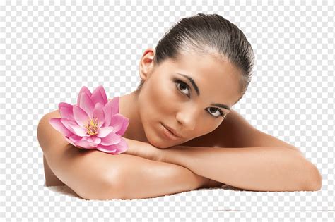 woman holding pink water lily flower day spa beauty parlour massage