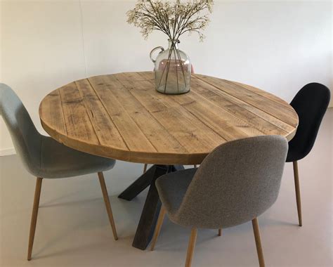 ronde houten eettafel senn massief houten tafel met spinpoot