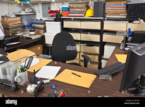 messy busy desk   warehouse  office stock photo alamy
