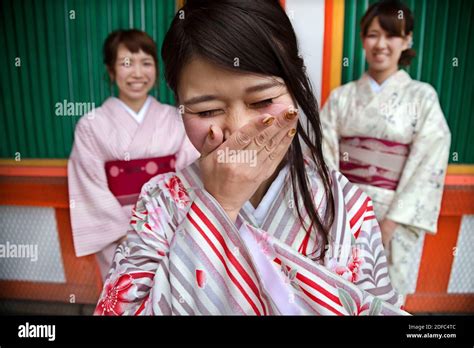 Japan Kyoto Three Japanese Girls Have Fun And Smile At Yasaka Shrine