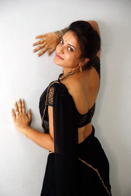 tamil latest actress janani reddy  black transpaent saree  netted designer blouse images