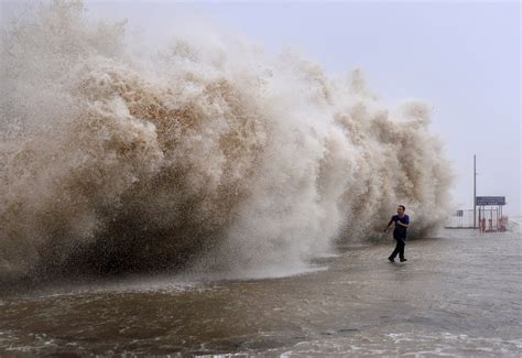 typhoon kills    people  china reports    york times