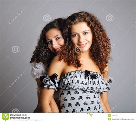 twins embracing stock image image of attractive pair