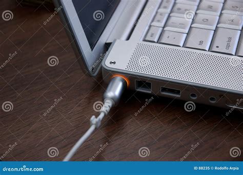 laptop charging stock image image  computer cable charging
