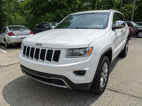 pre owned  jeep grand cherokee limited  bright white clearcoat