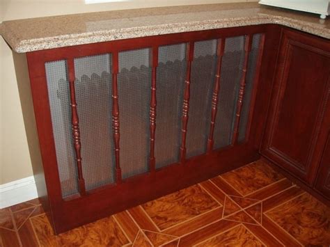hand crafted kitchen cabinet install  custom radiator