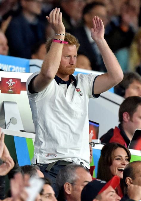 Prince Harry Raised His Arms Over His Read During The