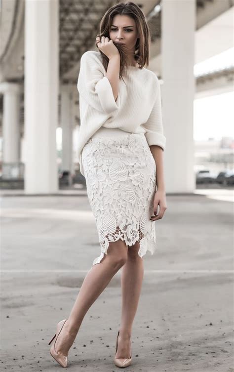 picture of white lace over the knee skirt an off white sweater and nude pumps