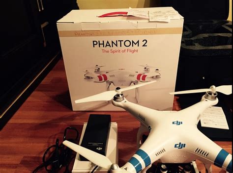 drone dji phantom  batterie   caricabatterie posot class