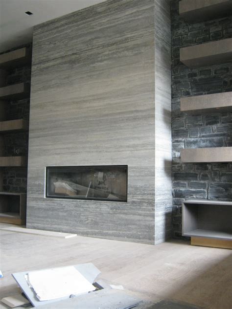 armstrong residence fireplace surround  ocean silver travertinoocean silver travert