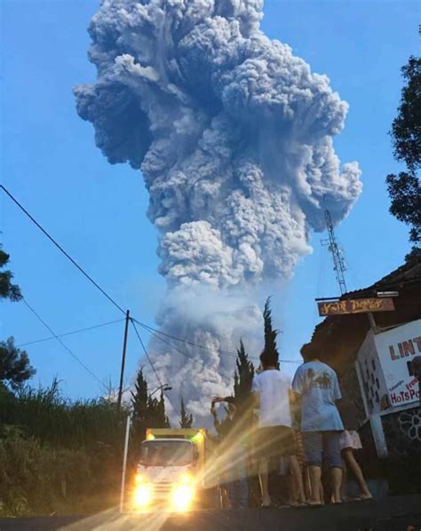 indonesias mount merapi erupts spewing ash columns km   air  prompting airport