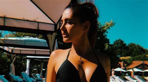 nargis fakhri is setting italy on fire in her black monokini movies news