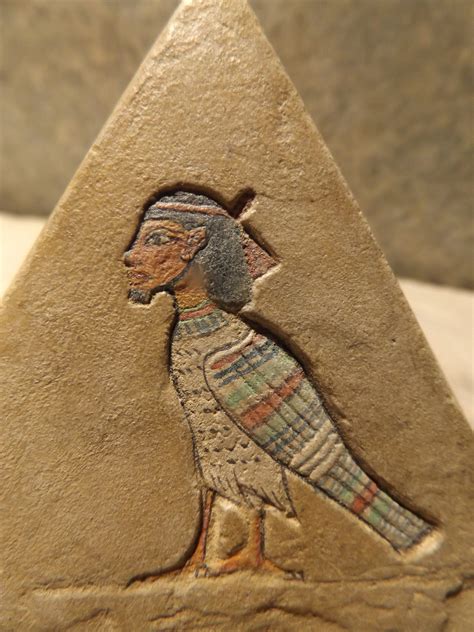 egyptian pyramid sculpture art featuring bast khonsu anubis