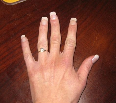 wedding nails      insanely crooked middle finger