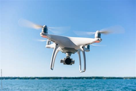 drone flying  water  stocksy contributor jen grantham stocksy