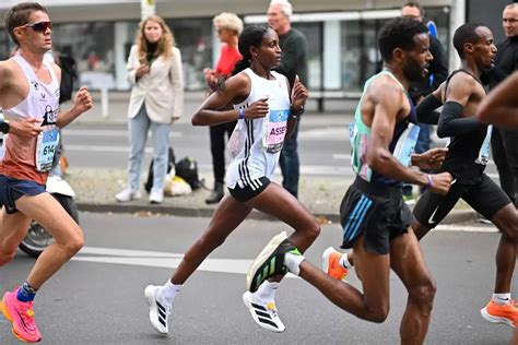 winning running shoes   berlin marathon  adidas adizero adios pro evo   big